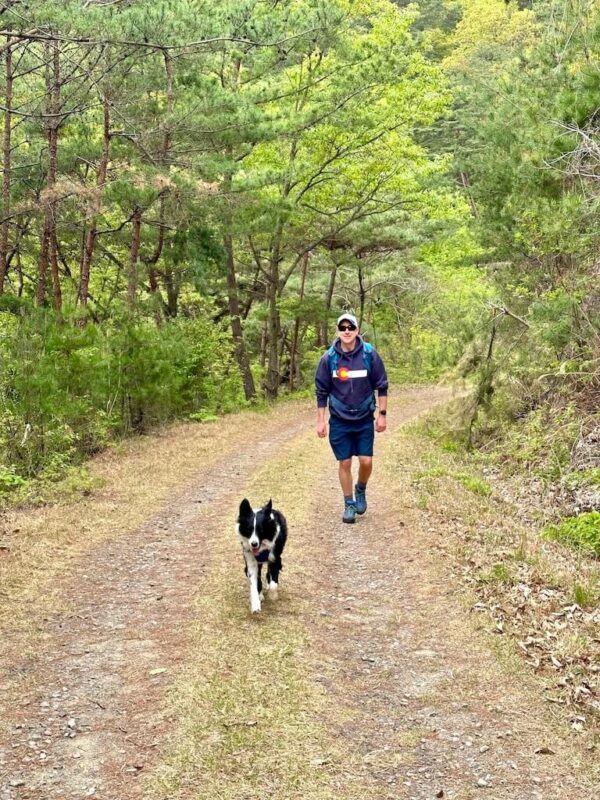 Colorado Saram and his border collie, Winnie, hike in South Korea.