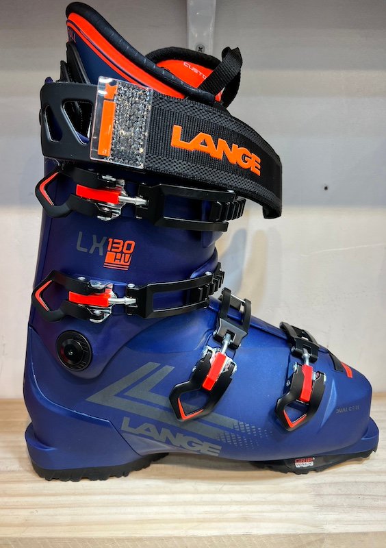 Lange LX 130 HV ski boots in blue and orange. These boots are designed for expert skiers and offer high performance features.