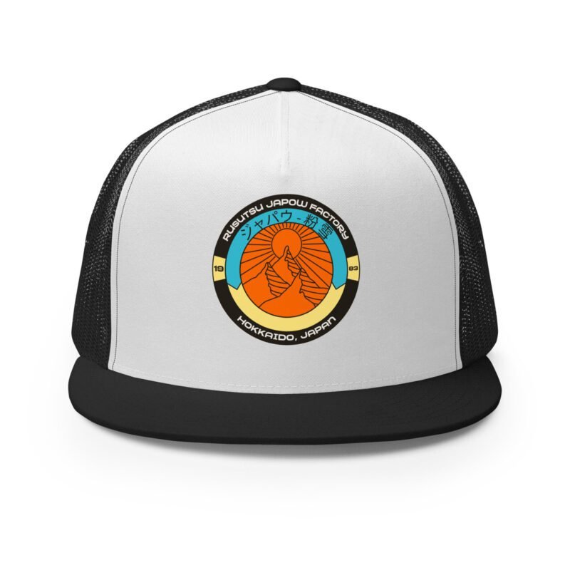 Front view of the Retro Rusutsu Japow Trucker Hat in black and white – flat bill trucker with vintage ski badge and mesh back
