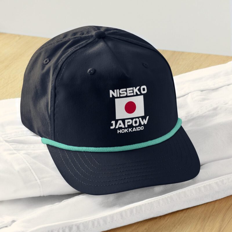 Front view of the Niseko Japow rope hat in navy and mint – retro flag patch with rope detail and 5-panel unstructured fit
