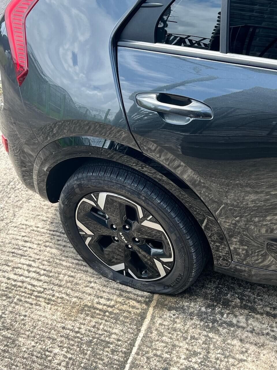Why Climbing Hallasan in Summer Nearly Broke Me (And What I’d Do Differently) 19 Flat tire on a Jeju Island rental car after Hallasan hike