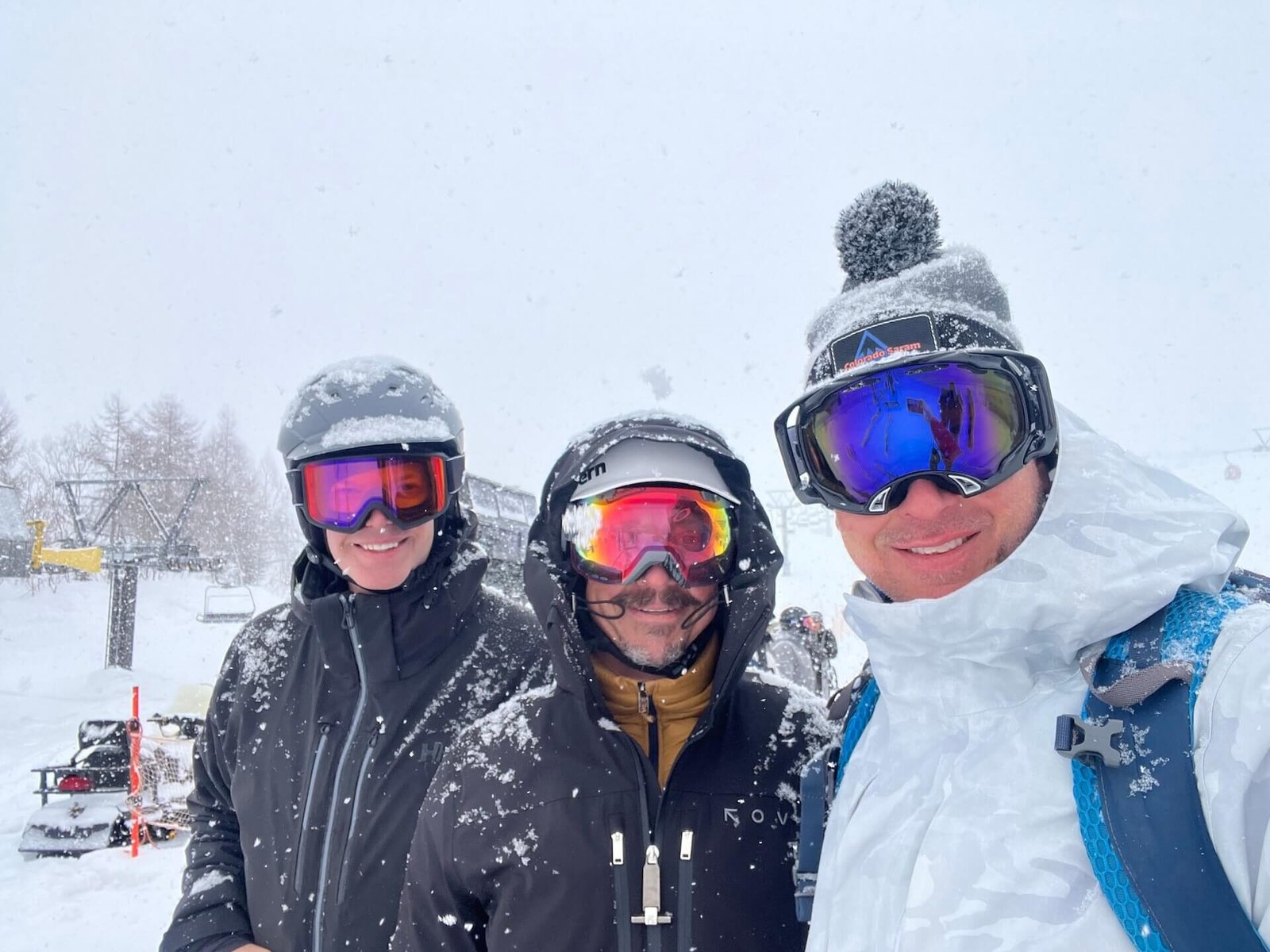 Skiers enjoying fresh powder during a 2025 Hokkaido ski trip in Niseko and Rusutsu, Japan.