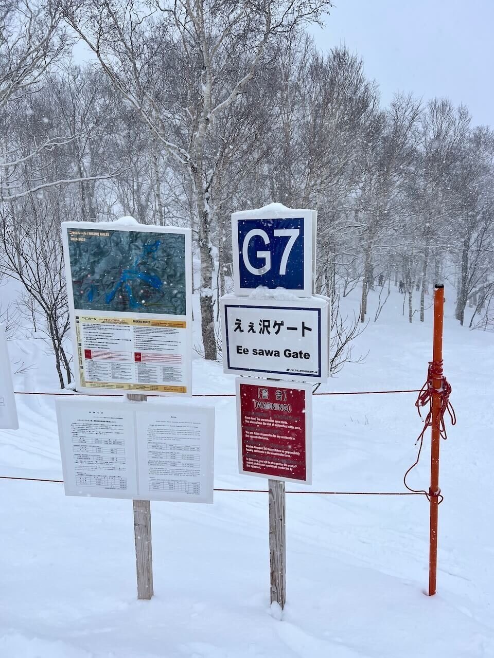 Hokkaido Ski and Snowboard Packing List: Advice After Multiple Visits 5 G7 Ee Sawa backcountry access gate at Niseko with posted rules and warnings