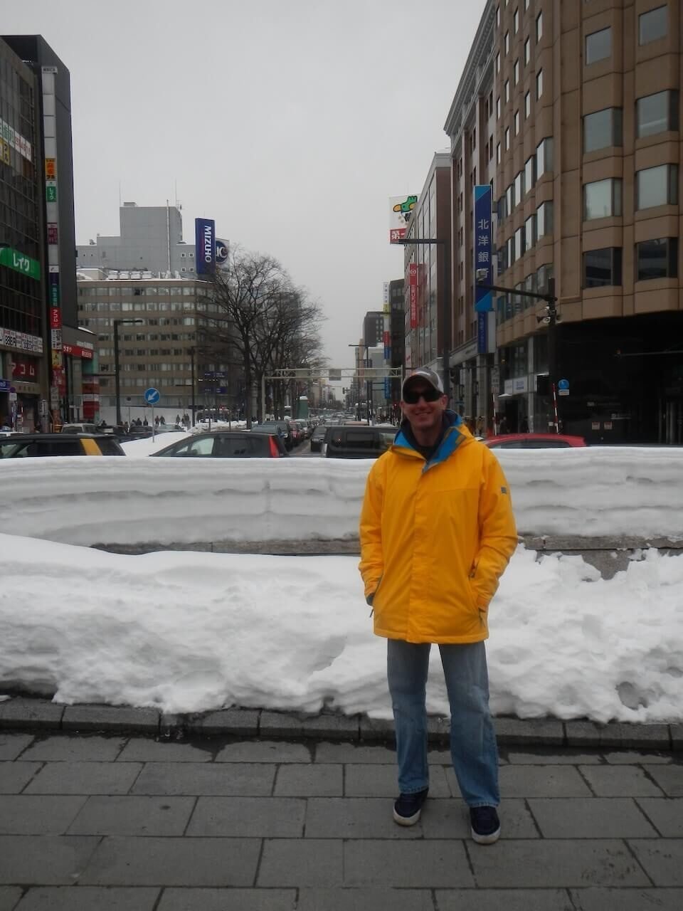 Hokkaido Ski and Snowboard Packing List: Advice After Multiple Visits 6 Skier wearing street shoes in snowy Sapporo during a winter trip to Hokkaido