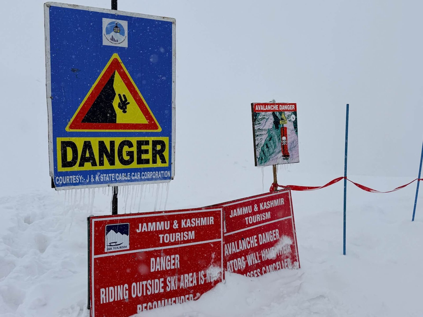 Do You Need a Guide to Ski Gulmarg? 4 Avalanche danger and backcountry warning signs near Phase 2 gondola station in Gulmarg Kashmir