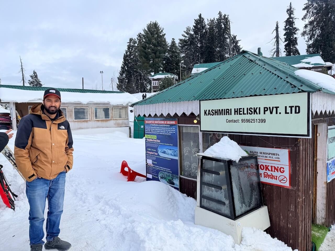 Do You Need a Guide to Ski Gulmarg? 9 Local Gulmarg ski guide Irfan standing outside the Kashmir Heliski launch area in Gulmarg Kashmir